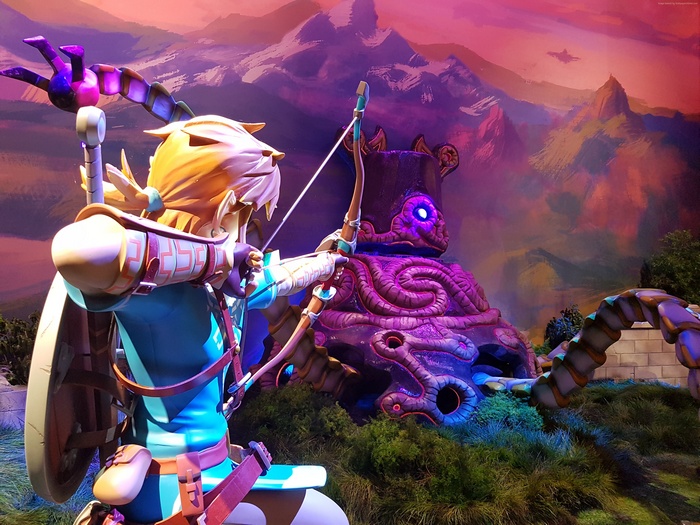 Link from The Legend of Zelda: Breath of the Wild with a Guardian