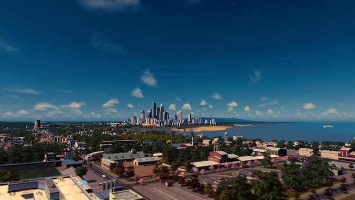 Cityscape with skyscrapers and ocean view