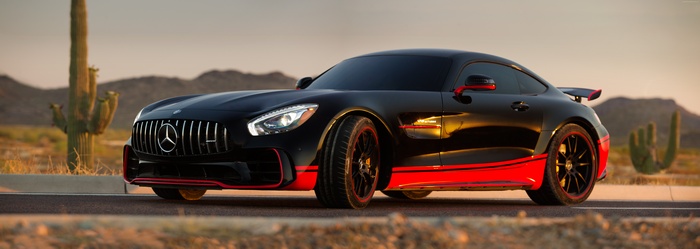 Black Mercedes-Benz AMG GT R with red accents in desert