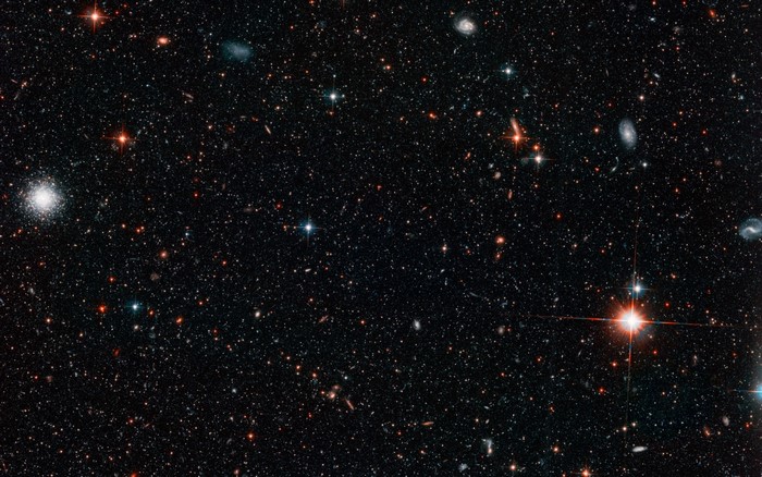 Deep space view with galaxies and stars
