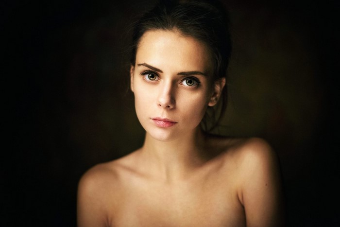 Portrait of a young woman with heterochromia