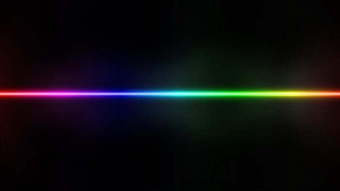Abstract rainbow light line on black background