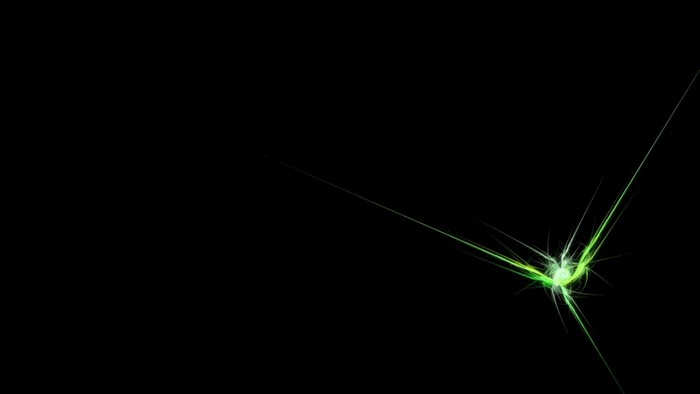 Abstract green light streaks on black background
