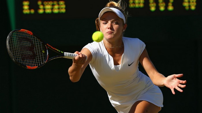 Katie Swan playing tennis at Wimbledon