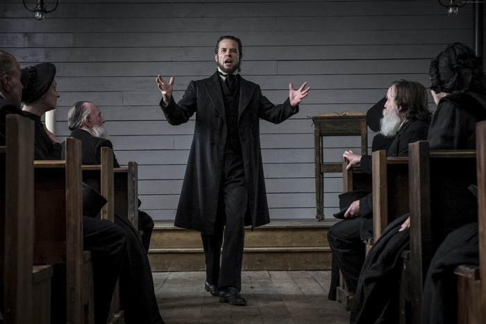 Guy Pearce in a church sermon