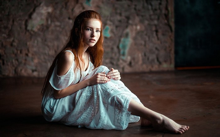 Redhead Woman Sitting in White Dress Portrait