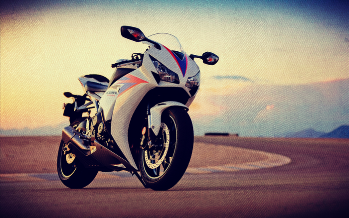White Honda CBR motorcycle on a road