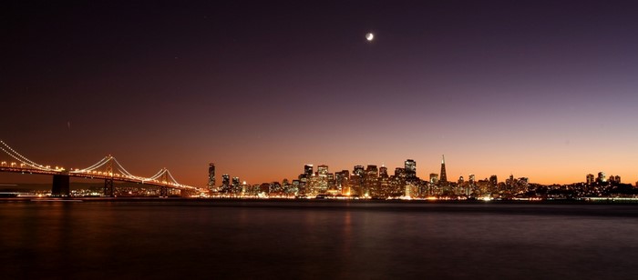 San Francisco skyline and Bay Bridge at dusk