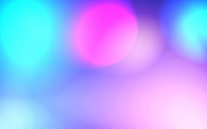 Abstract colorful bokeh lights with pink and cyan hues