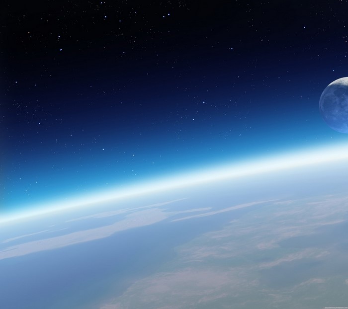 Earth's atmosphere and moon from space