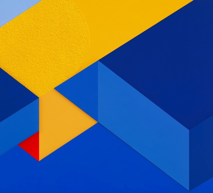 Abstract geometric shapes in yellow, blue, and red