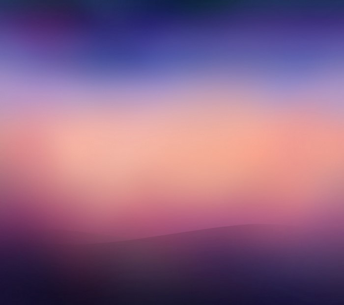 Abstract gradient of purple, pink, and orange hues