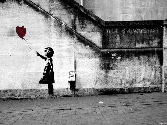 Girl with red balloon graffiti by Banksy