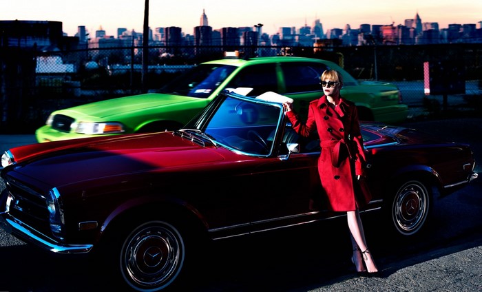 Christina Ricci in red coat with vintage car and green taxi