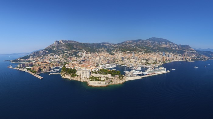Panoramic aerial view of Monaco coastline and mountains