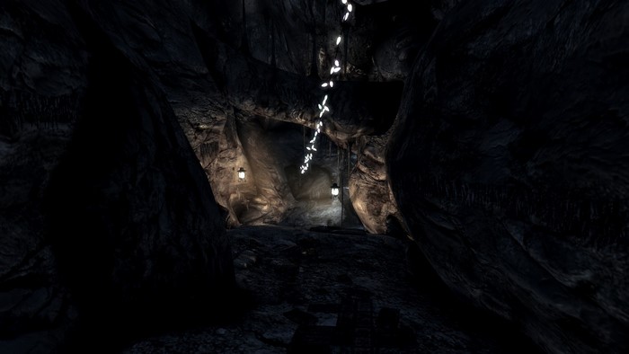 Cave interior with string lights and lanterns