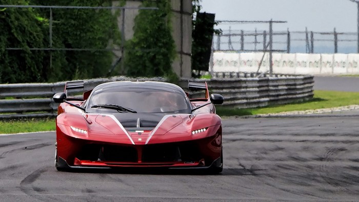 Ferrari LaFerrari FXXK on a race track