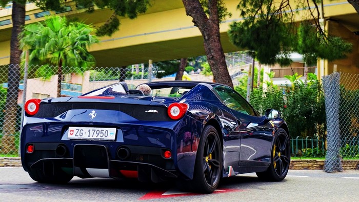 Blue Ferrari 458 Italia with Swiss license plate