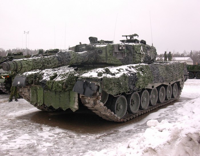 Leopard 2 tank in camouflage with snow