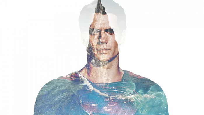 Superman double exposure with mountains and ocean