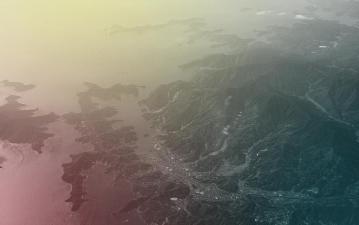 Aerial view of islands and mountains with haze