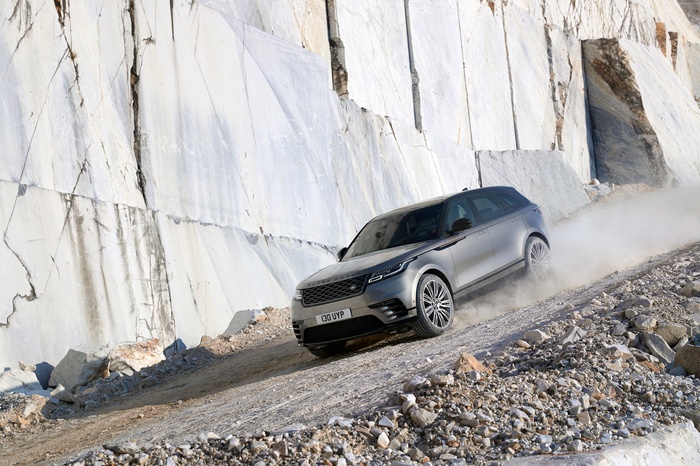Range Rover Velar driving on a dirt road
