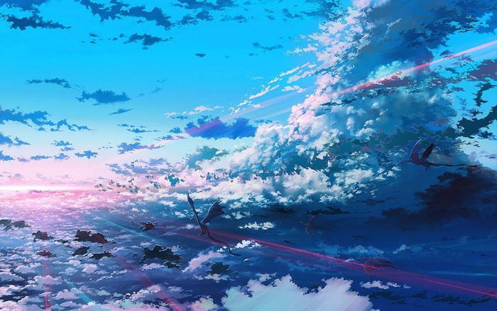 Dragons flying through a cloudy sky at sunset