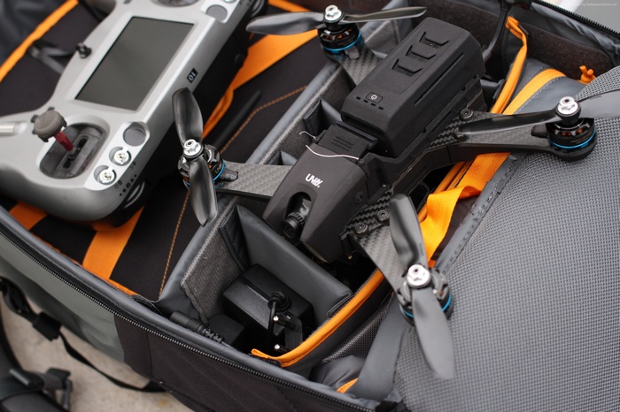 UVIFY DRACO drone and controller in a bag
