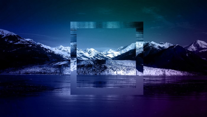 Snowy mountains reflected in a lake with a square overlay