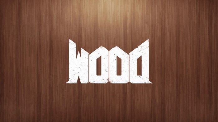 The word "WOOD" in a stylized font on a wooden background