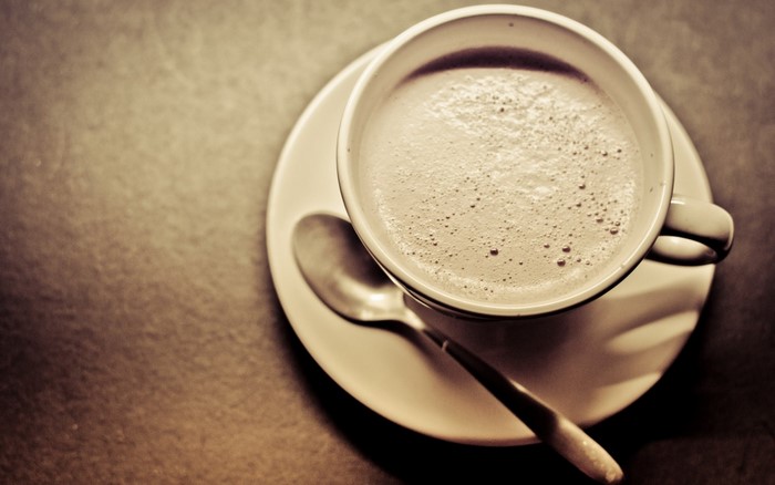 Close-up of a coffee cup with a spoon
