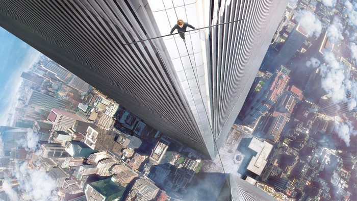 Philippe Petit walks on a tightrope between the Twin Towers