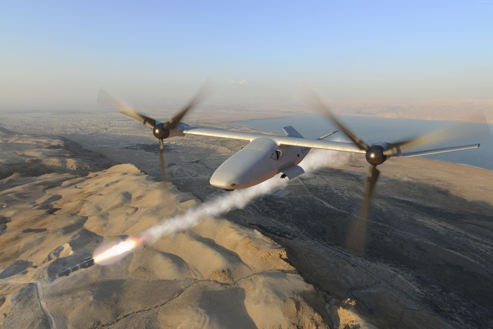 Tern Tailsitter Drone firing missile over desert landscape