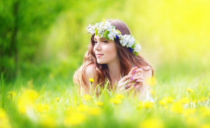 Woman Wearing Flower Wreath in Sunny Meadow