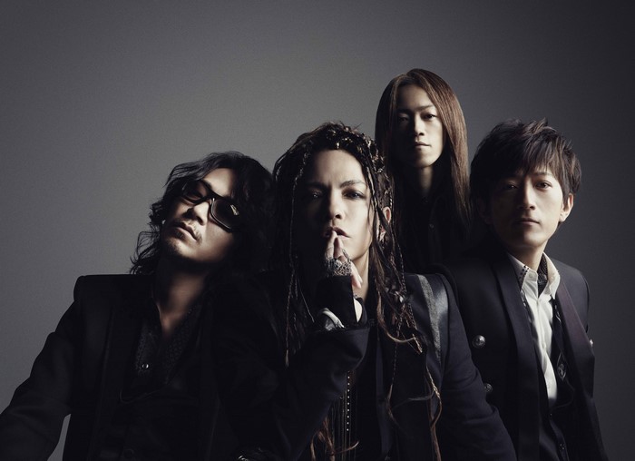 L'Arc-en-Ciel band members in a studio photoshoot