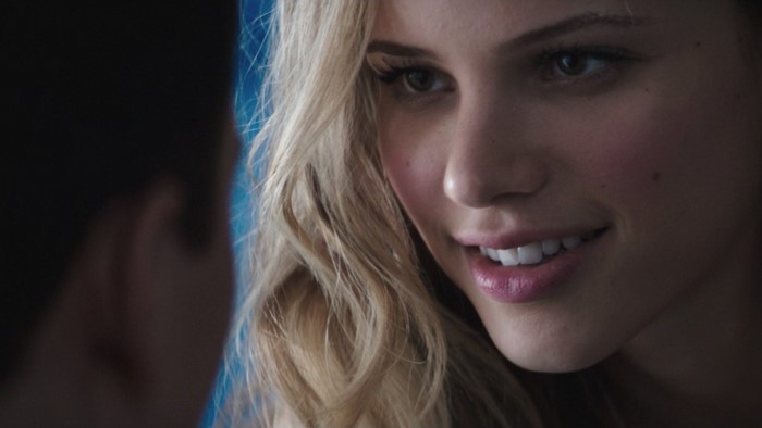 Halston Sage smiling close up portrait