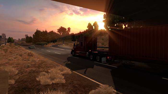 American Truck Simulator screenshot of a truck at sunset