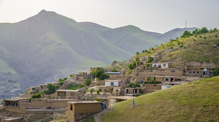 Village nestled in a mountainous valley in Afghanistan