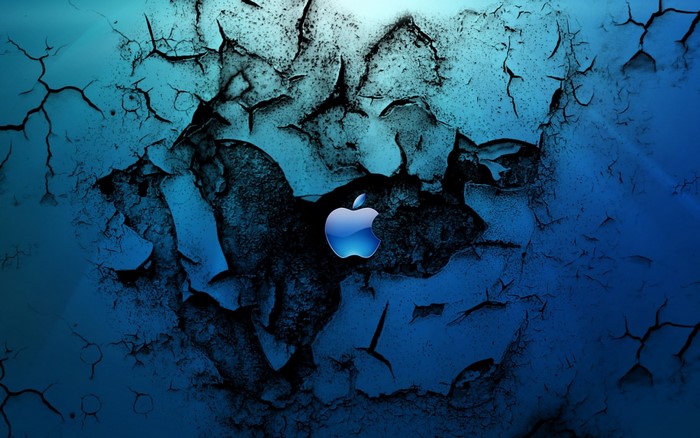Apple logo on cracked blue grunge background