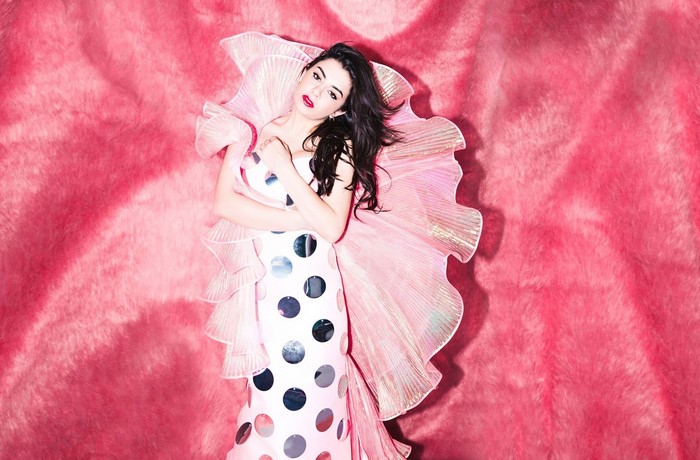 Woman in polka dot dress with pink ruffles