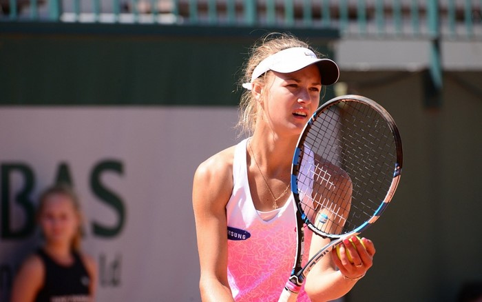 Anna Kalinskaya playing tennis at a tournament