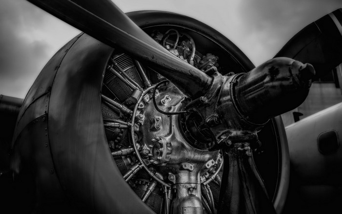 Close-up of a vintage aircraft engine and propeller