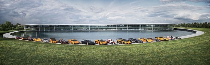 McLaren cars lined up in front of McLaren Technology Centre