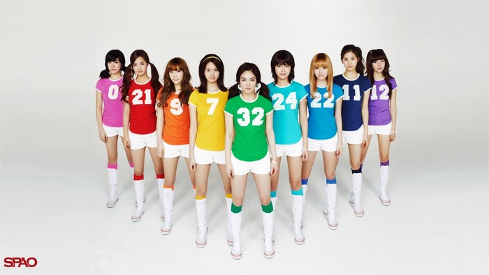Girls Generation members in colorful jerseys