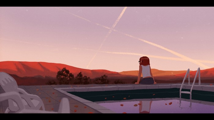 Girl sitting by a swimming pool at sunset