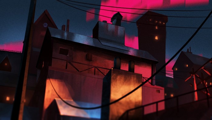 Industrial buildings at night with red lighting