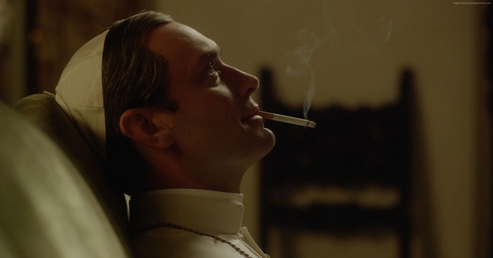 Jude Law as Pope Pius XIII smoking in The Young Pope