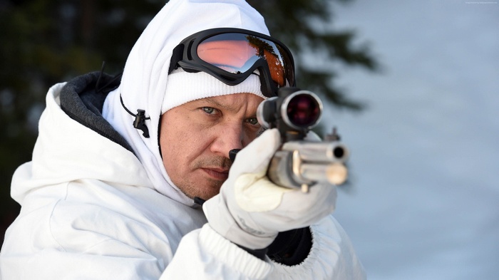 Jeremy Renner from Wind River aiming a rifle