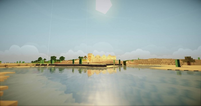 Minecraft desert cityscape with water reflection