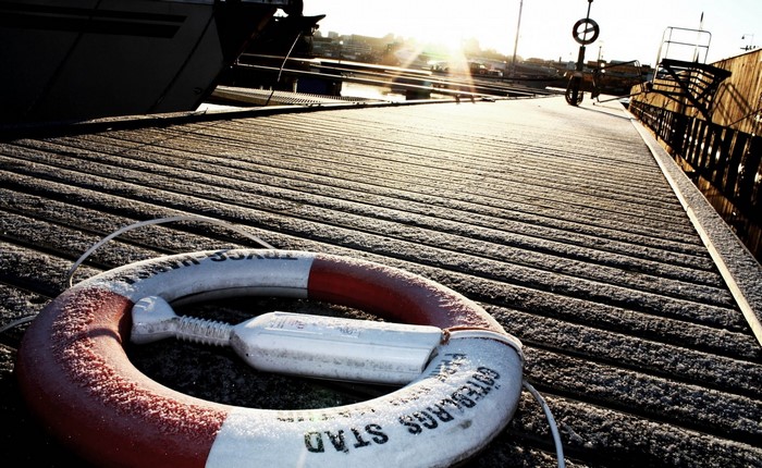 Lifebuoy on a frosty dock in Sweden
